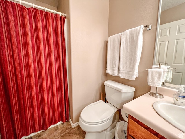 2051 W Canyon View Dr S, St George, UT 84770 - full bathroom featuring vanity, toilet, tile patterned floors, and a shower with curtain