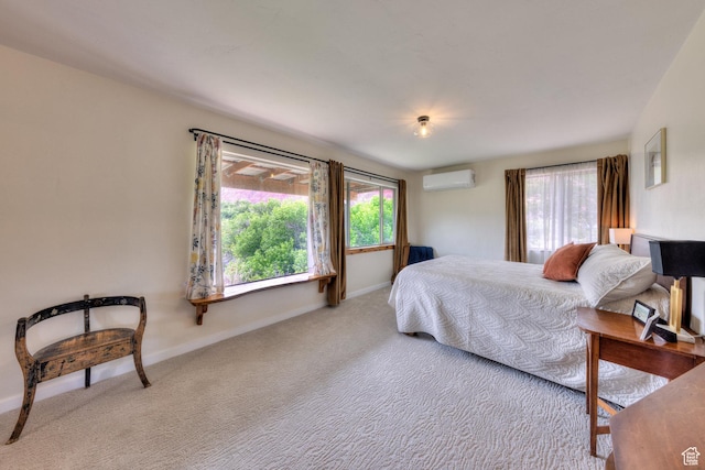 7020 E Creekside Ln, Castle Valley, UT 84532 - bedroom with an AC wall unit, carpet, and baseboards
