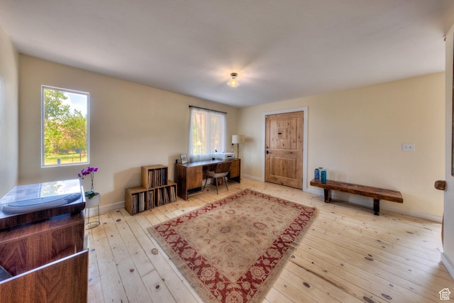 7020 E Creekside Ln, Castle Valley, UT 84532 - office space featuring hardwood / wood-style floors and baseboards