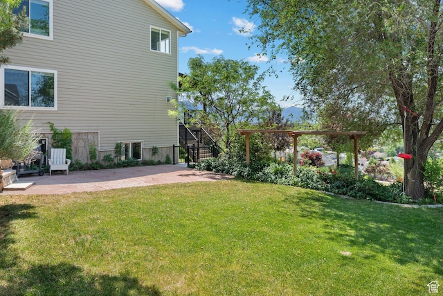 663 N 880 E, Springville, UT 84663 - view of green lawn with a patio area