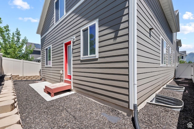 11066 S Becks Ln, South Jordan, UT 84095 - view of property exterior with a fenced backyard and a gate