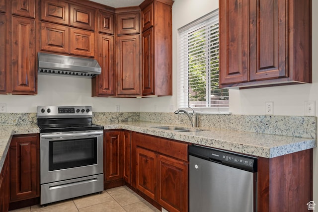 11066 S Becks Ln, South Jordan, UT 84095 - kitchen with stainless steel appliances, exhaust hood, a sink, light tile patterned flooring, and light stone countertops