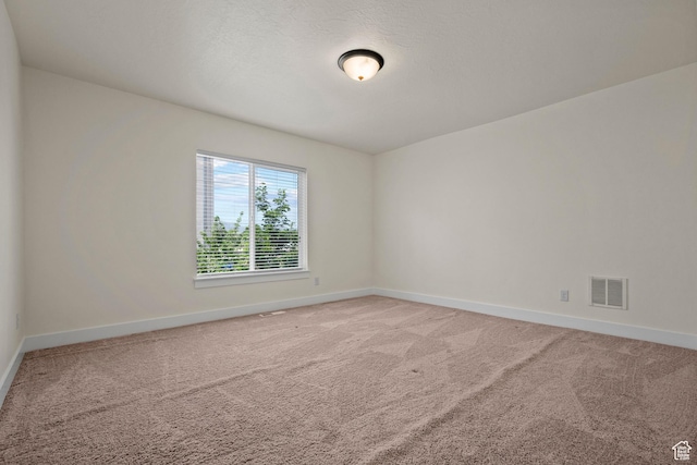 11066 S Becks Ln, South Jordan, UT 84095 - empty room featuring baseboards and light carpet
