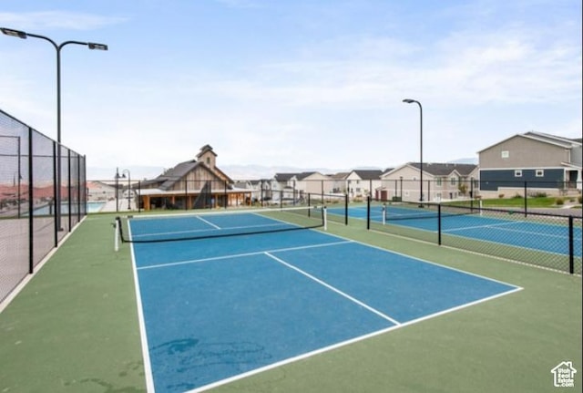 8518 W Cordero Dr, Magna, UT 84044 - view of tennis court featuring a residential view