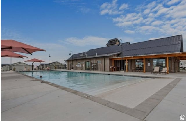 8518 W Cordero Dr, Magna, UT 84044 - community pool featuring a patio