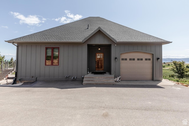 761 S Lakeview Dr, Garden City, UT 84028 - view of front facade featuring roof with shingles