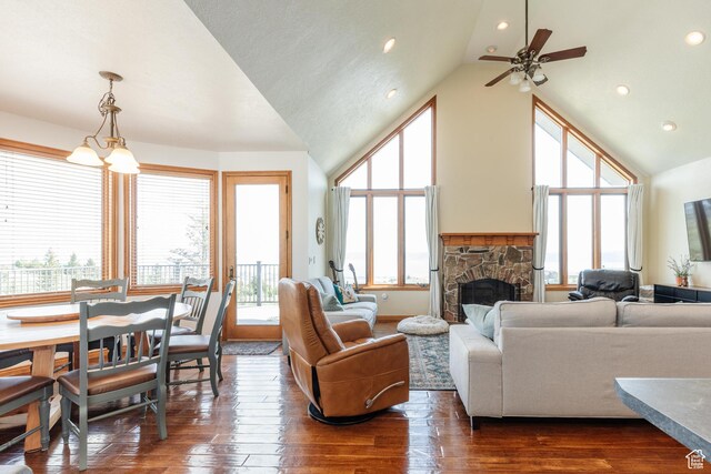 761 S Lakeview Dr, Garden City, UT 84028 - living room with a fireplace, dark wood-style floors, a ceiling fan, high vaulted ceiling, and recessed lighting