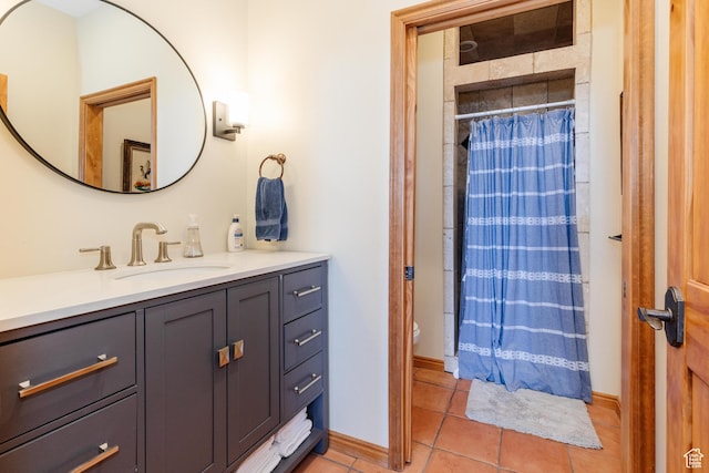 761 S Lakeview Dr, Garden City, UT 84028 - full bath featuring tile patterned flooring, vanity, toilet, a shower with shower curtain, and baseboards