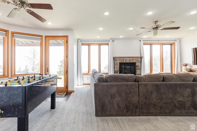 761 S Lakeview Dr, Garden City, UT 84028 - living room featuring a ceiling fan, recessed lighting, a fireplace, and healthy amount of natural light