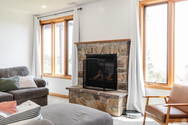 761 S Lakeview Dr, Garden City, UT 84028 - living room with plenty of natural light, baseboards, and a fireplace