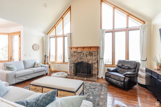761 S Lakeview Dr, Garden City, UT 84028 - living area with a stone fireplace, hardwood / wood-style floors, and high vaulted ceiling