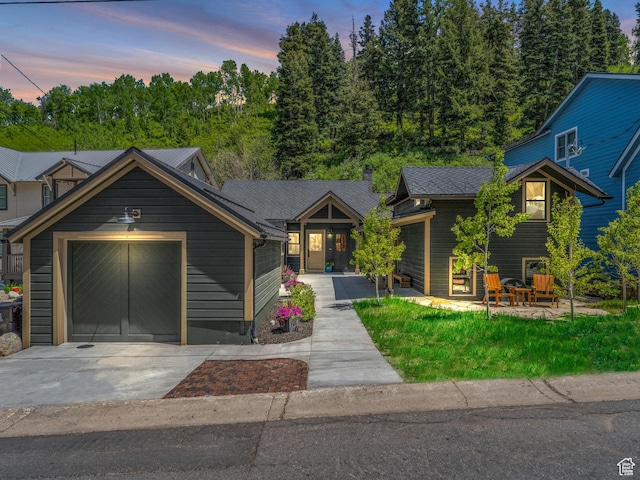 173 Daly Ave, Park City, UT 84060 - view of front facade with concrete driveway and a garage