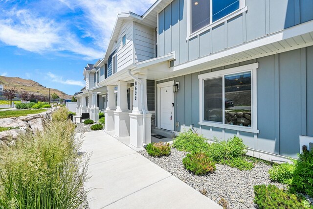 8622 W Cordero Dr S Unit 1170, Magna, UT 84044 - property entrance with board and batten siding