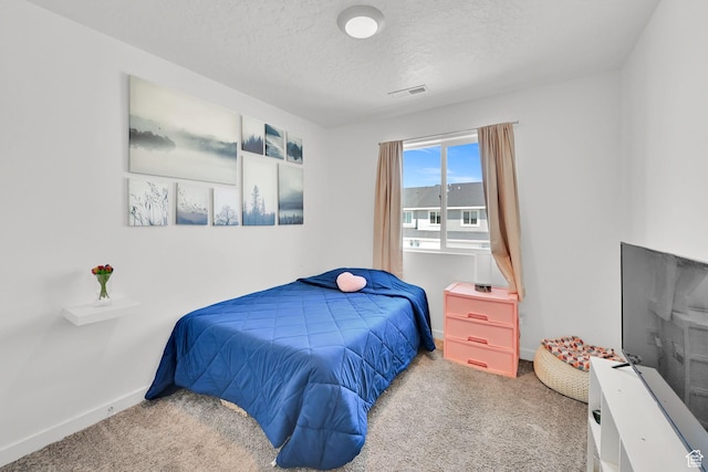 8622 W Cordero Dr S Unit 1170, Magna, UT 84044 - bedroom with carpet, a textured ceiling, and baseboards