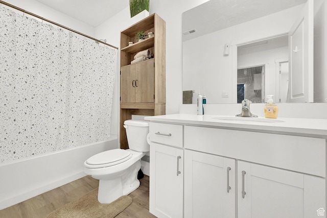 8622 W Cordero Dr S Unit 1170, Magna, UT 84044 - full bathroom featuring vanity, toilet, wood finished floors, and shower / bath combo