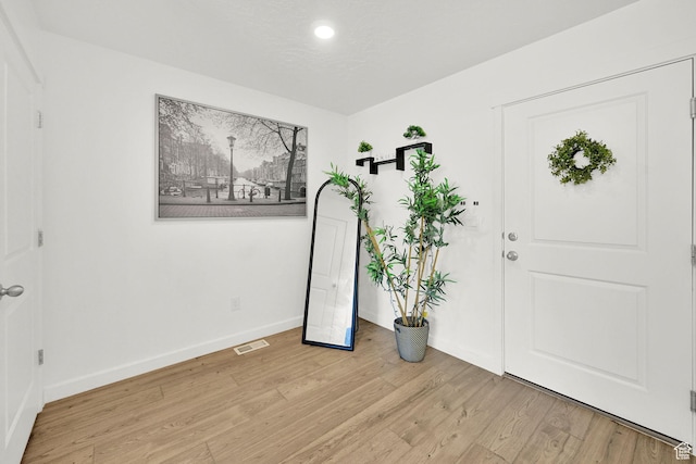 8622 W Cordero Dr S Unit 1170, Magna, UT 84044 - foyer entrance featuring light wood-type flooring, baseboards, and recessed lighting