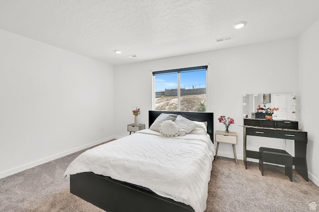 8622 W Cordero Dr S Unit 1170, Magna, UT 84044 - carpeted bedroom with baseboards, a textured ceiling, and recessed lighting
