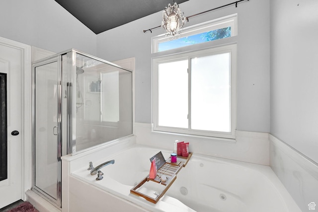 7776 S 2175 E, South Weber, UT 84405 - bathroom with a shower stall, a jetted tub, and a chandelier