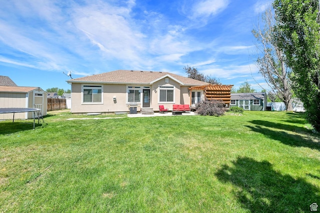 7776 S 2175 E, South Weber, UT 84405 - back of property featuring stucco siding, entry steps, a pergola, and a trampoline