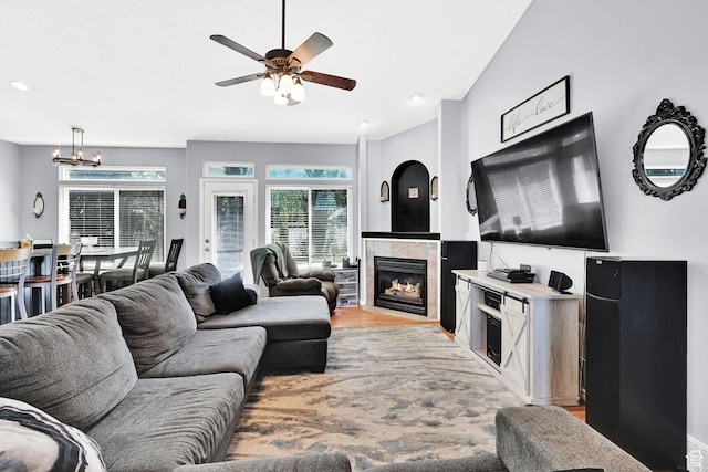 7776 S 2175 E, South Weber, UT 84405 - living area with ceiling fan, a chandelier, a fireplace, and wood finished floors