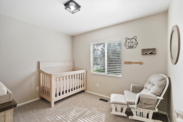 789 W 2005 N, Clinton, UT 84015 - bedroom with a crib, baseboards, and carpet flooring