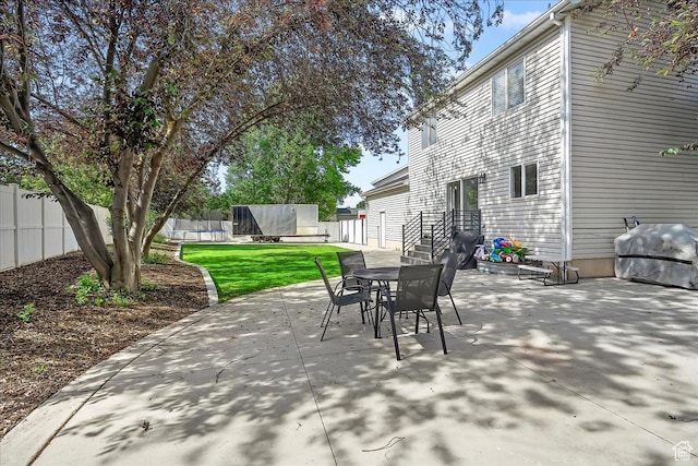 789 W 2005 N, Clinton, UT 84015 - view of patio / terrace featuring a trampoline, area for grilling, and outdoor dining space
