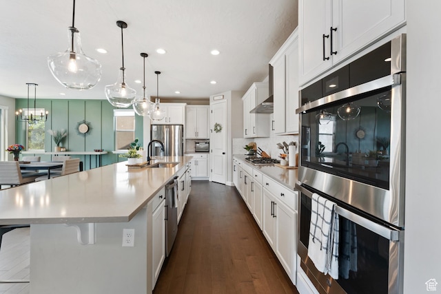 963 W Minuteman Ln, Saratoga Springs, UT 84045 - kitchen with stainless steel appliances, light countertops, recessed lighting, white cabinetry, and tasteful backsplash