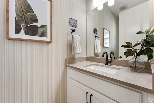 963 W Minuteman Ln, Saratoga Springs, UT 84045 - bathroom featuring wallpapered walls and vanity