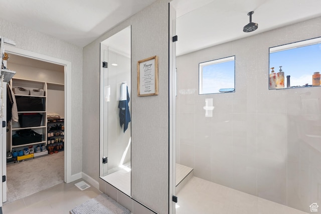 963 W Minuteman Ln, Saratoga Springs, UT 84045 - full bathroom with a shower stall, a spacious closet, and tile patterned flooring