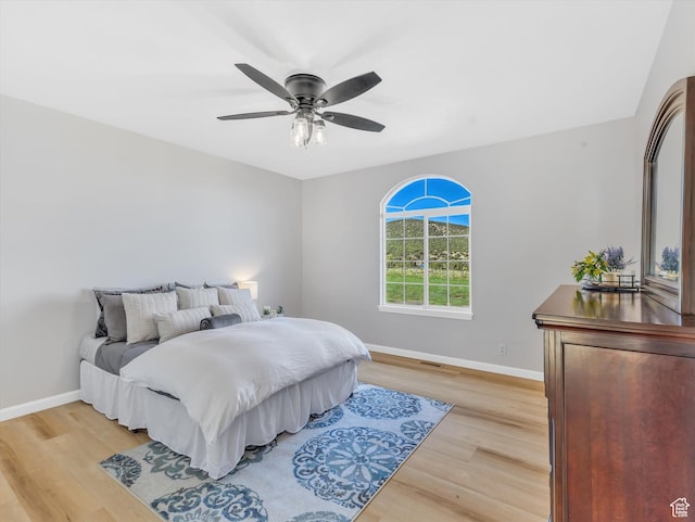 1293 N Buck Run Rd, Rush Valley, UT 84069 - bedroom featuring light wood-type flooring, baseboards, and a ceiling fan