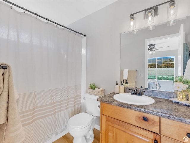 1293 N Buck Run Rd, Rush Valley, UT 84069 - full bath with ensuite bath, vanity, toilet, a ceiling fan, and a shower with curtain