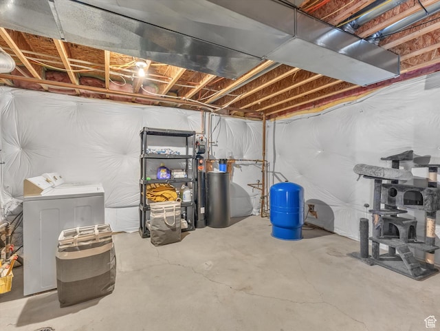 1293 N Buck Run Rd, Rush Valley, UT 84069 - unfinished basement featuring independent washer and dryer, a water pressure tank, and a water softener system
