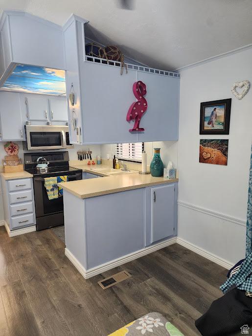 840 N Twin Lakes Dr Unit 127, St George, UT 84770 - kitchen featuring stainless steel microwave, black electric range oven, dark wood-style flooring, light countertops, and a peninsula