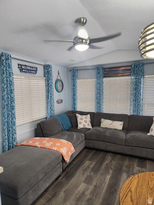 840 N Twin Lakes Dr Unit 127, St George, UT 84770 - living room featuring vaulted ceiling, wood finished floors, and ceiling fan