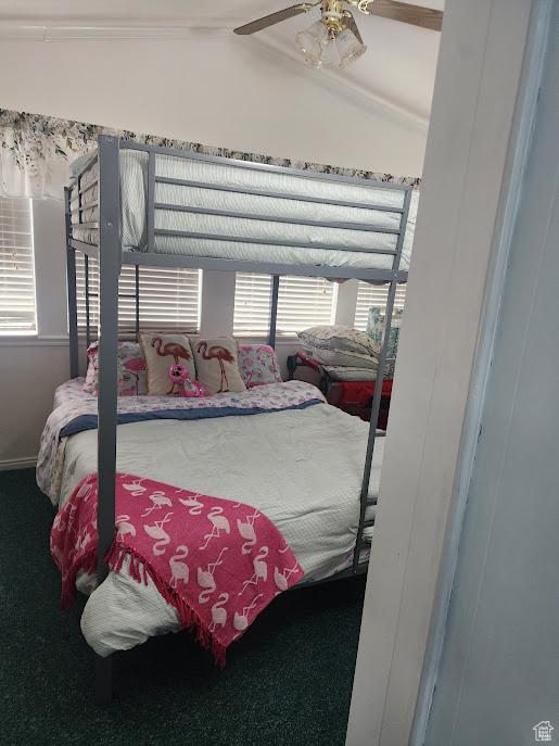 840 N Twin Lakes Dr Unit 127, St George, UT 84770 - carpeted bedroom featuring lofted ceiling, a ceiling fan, baseboards, and crown molding