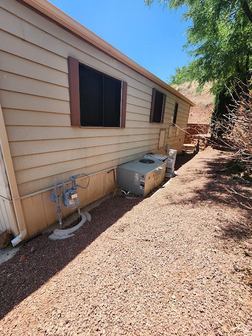 840 N Twin Lakes Dr Unit 127, St George, UT 84770 - view of side of property featuring cooling unit