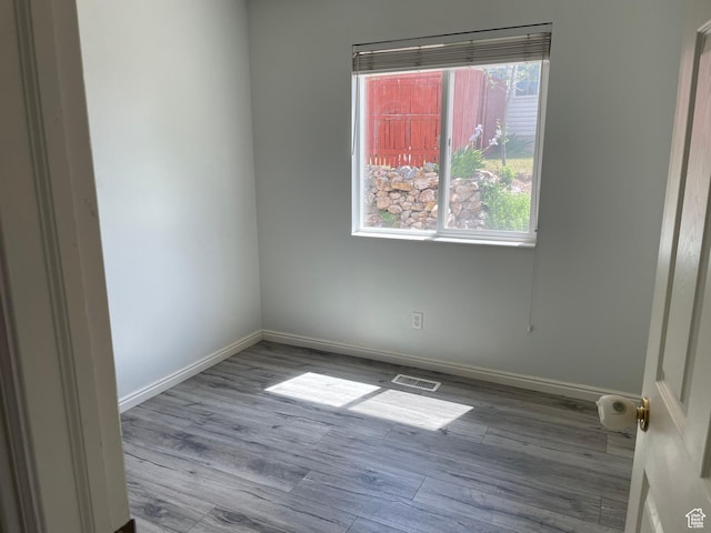 288 N Peach St, Santaquin, UT 84655 - unfurnished room with healthy amount of natural light, wood finished floors, and baseboards
