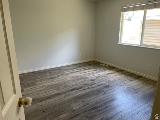 288 N Peach St, Santaquin, UT 84655 - spare room with dark wood-style flooring and baseboards