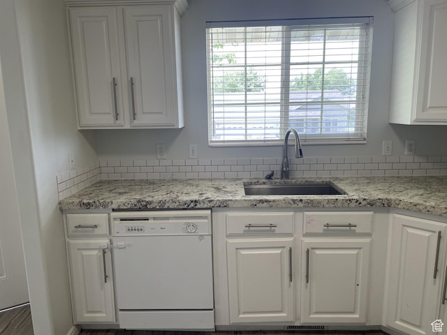 288 N Peach St, Santaquin, UT 84655 - kitchen with white dishwasher, a sink, and white cabinets
