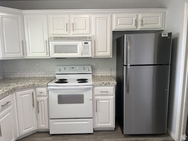 288 N Peach St, Santaquin, UT 84655 - kitchen featuring white appliances and white cabinets