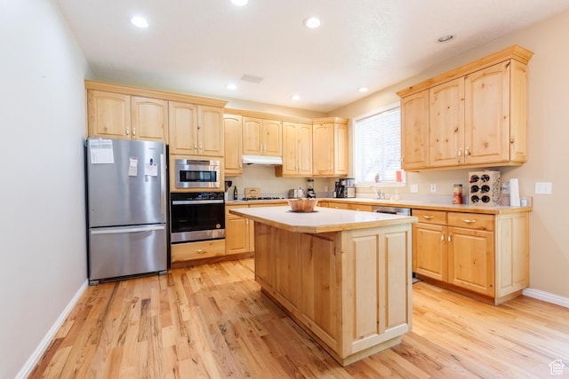 1809 E 1815 N, North Logan, UT 84341 - kitchen featuring stainless steel appliances, light brown cabinetry, light wood-style floors, light countertops, and recessed lighting