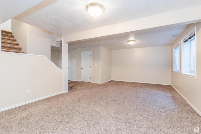 1809 E 1815 N, North Logan, UT 84341 - basement with carpet flooring, a textured ceiling, stairway, and baseboards