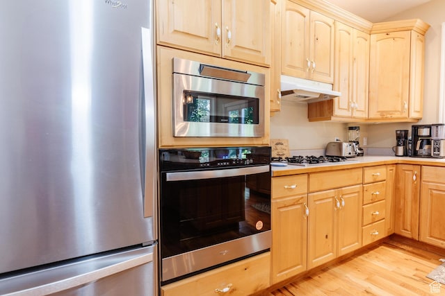 1809 E 1815 N, North Logan, UT 84341 - kitchen featuring stainless steel appliances, under cabinet range hood, light wood finished floors, light countertops, and light brown cabinetry