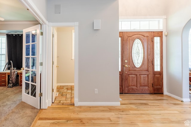 1809 E 1815 N, North Logan, UT 84341 - foyer entrance with arched walkways, baseboards, ornamental molding, and wood finished floors