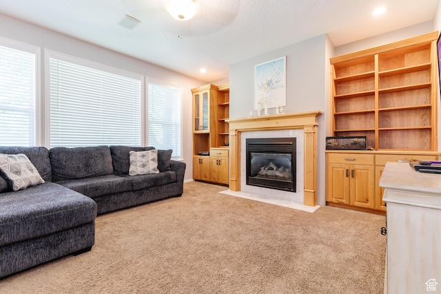 1809 E 1815 N, North Logan, UT 84341 - living area with light colored carpet, a fireplace with flush hearth, recessed lighting, and a ceiling fan
