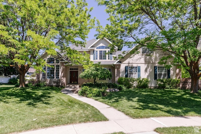 1809 E 1815 N, North Logan, UT 84341 - view of front facade featuring a front yard and stucco siding