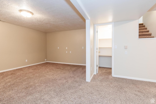 1809 E 1815 N, North Logan, UT 84341 - below grade area with carpet flooring, stairway, a textured ceiling, and baseboards