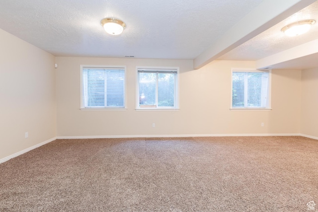 1809 E 1815 N, North Logan, UT 84341 - carpeted spare room with a textured ceiling, baseboards, and beamed ceiling