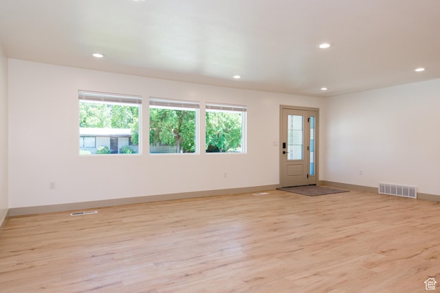286 E 870 N, Logan, UT 84321 - spare room featuring healthy amount of natural light, recessed lighting, light wood-style floors, and baseboards