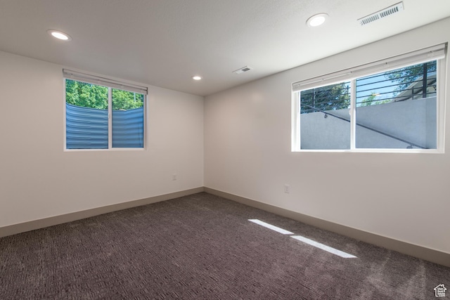 286 E 870 N, Logan, UT 84321 - empty room featuring recessed lighting, carpet, plenty of natural light, and baseboards